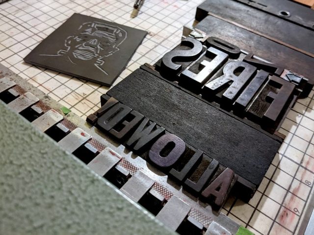 Morgan Sign Co showcard press with linocut and wood type